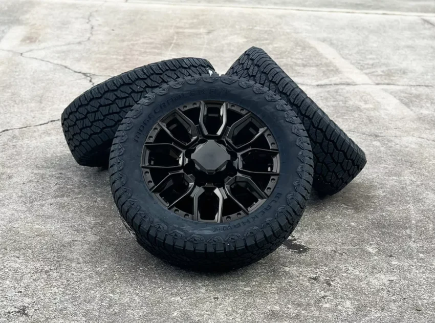 2011-2025 GMC Sierra 2500 Black SLT 20" 8-180 Wheels 265/60R20 A/T Tires